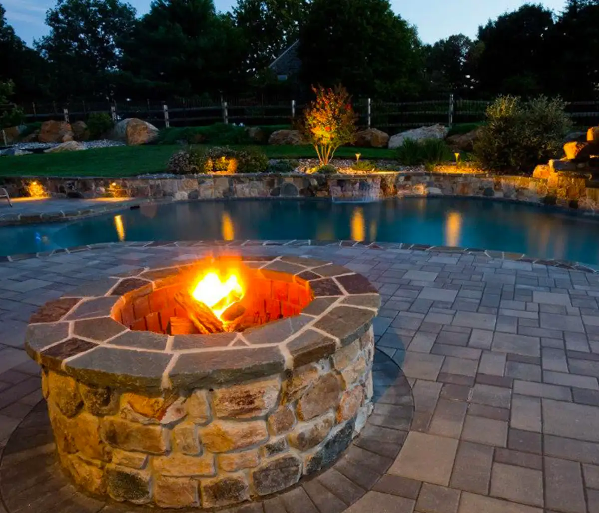 Outdoor fire feature installation by Evergreen Hardscaping