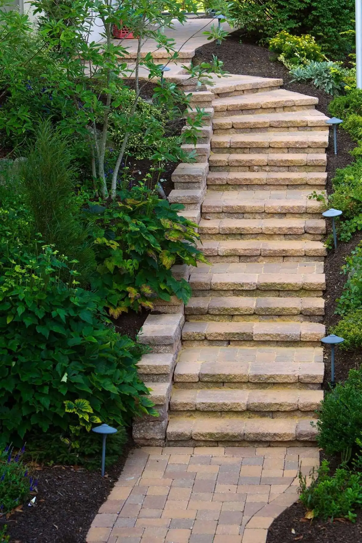 Natural stone masonry steps and patio by Evergreen Hardscaping