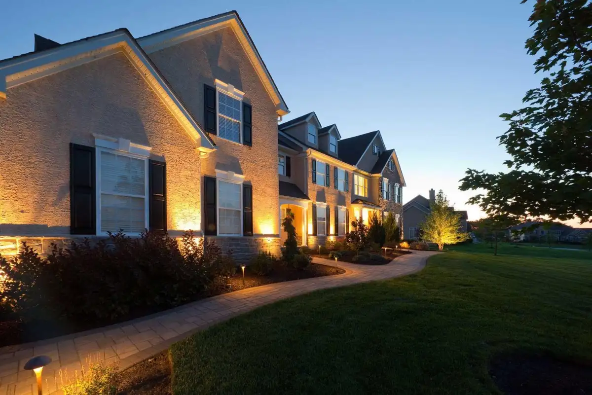 Complete outdoor living project with patio, pool, and landscaping by Evergreen Hardscaping