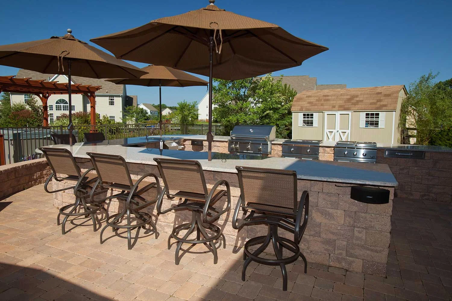 Custom outdoor living space built by Evergreen Hardscaping