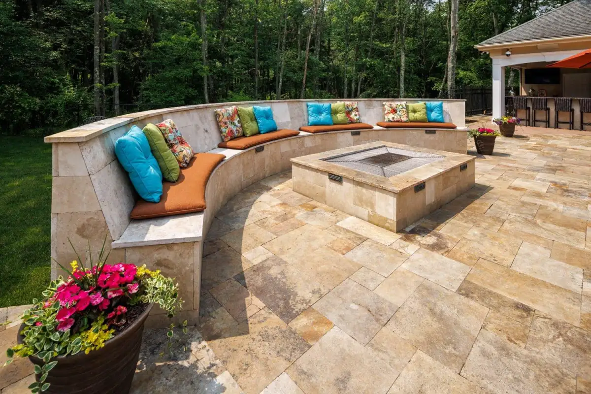 Custom outdoor pavilion with stone patio by Evergreen Hardscaping