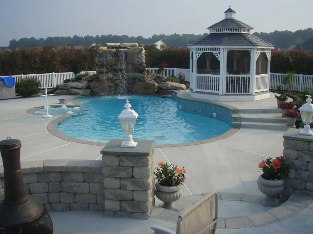 Swimming pool renovation with new coping and tile in Delaware