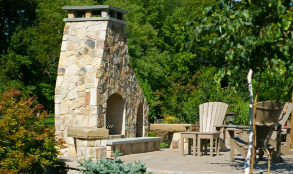 Ressler project — pool renovation with natural stone waterfall